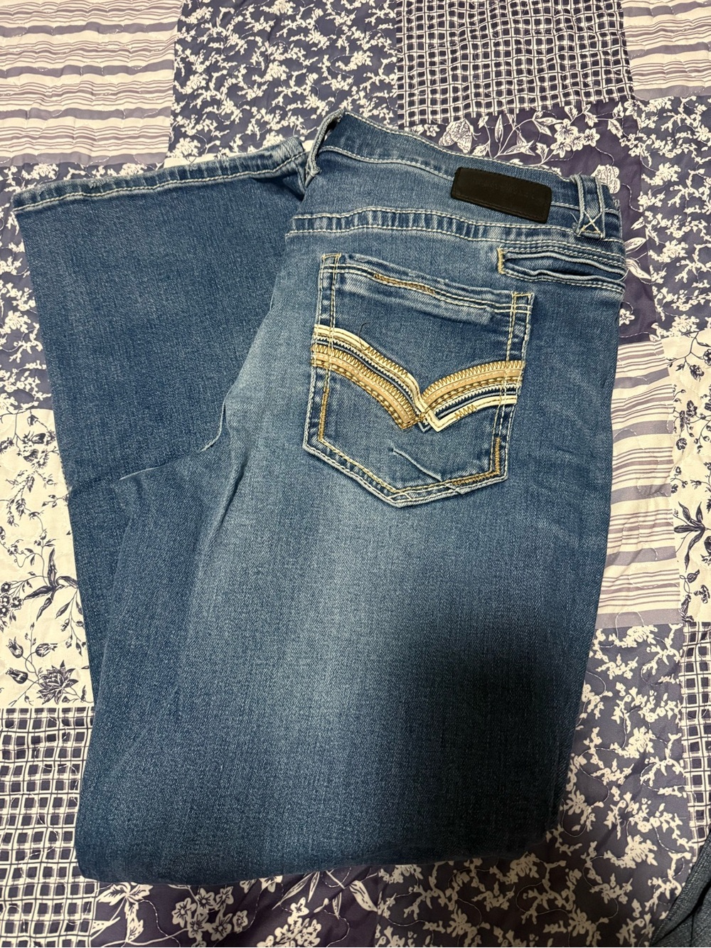 Buckle Men’s Blue Bootcut Jeans with Embroidered Back Pocket